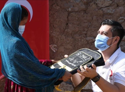 turkish charity gives school supplies to afghan refugee kids in pakistan