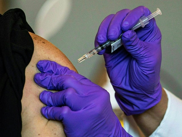 the rollout of vaccines   one of 12 key milestones in the coronavirus global crisis photo afp