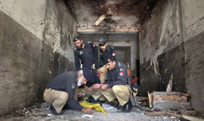 two killed 13 injured in swabi suicide attack