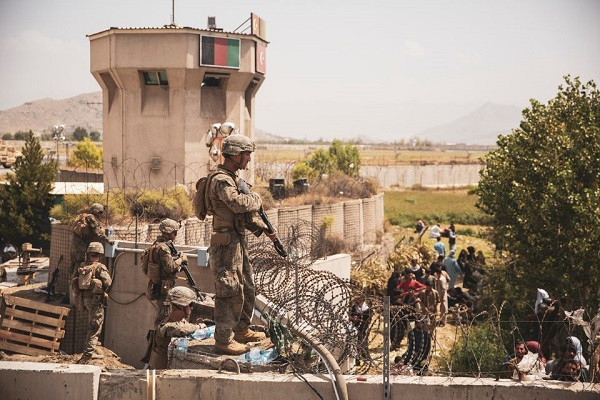 U.S. Marines stand guard at an Evacuee Control Checkpoint at Hamid Karzai International Airport, Kabul, Afghanistan, in this photo taken on August 20, 2021. PHOTO: REUTERS