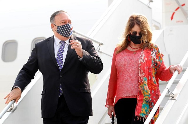 us secretary of state michael pompeo and his wife susan disembark from an aircraft upon their arrival at an airport in new delhi india october 26 2020 photo reuters