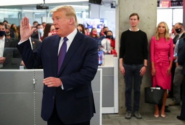 us president donald trump speaks to staff members while his son in law and senior advisor jared kushner and his white house press secretary kayleigh mcenany listen as he visits his presidential campaign headquarters on election day in nearby arlington virginia us november 3 2020 photo reuters us president donald trump speaks to staff members while his son in law and senior advisor jared kushner and his white house press secretary kayleigh mcenany listen as he visits his presidential campaign headquarters on election day in nearby arlington virginia us november 3 2020 photo reuters