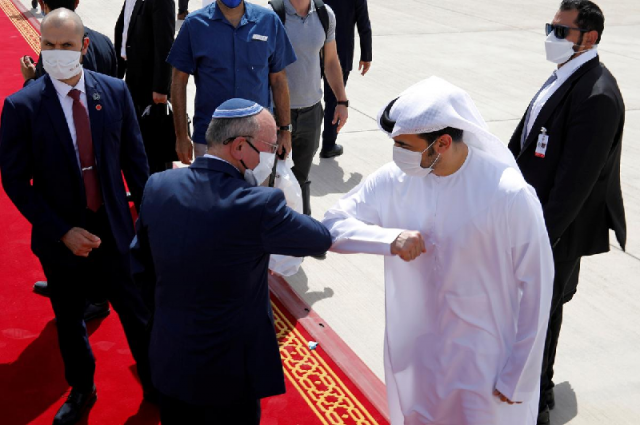israeli national security advisor meir ben shabbat elbow bumps with an emirati official as he makes his way to board the plane to leave abu dhabi september 1 2020 photo reuters israeli national security advisor meir ben shabbat elbow bumps with an emirati official as he makes his way to board the plane to leave abu dhabi september 1 2020 photo reuters