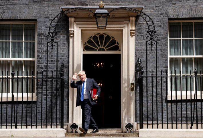 former british prime minister boris johnson walks at downing street in london britain july 6 2022 reuters