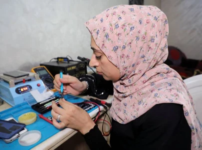in conservative gaza a woman finds rare job niche by repairing phones