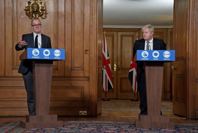 britain s prime minister boris johnson watches chief scientific adviser sir patrick vallance speak during a press conference where he is expected to announce new restrictions to help combat the coronavirus disease covid 19 outbreak at 10 downing street in london britain october 31 2020 alberto pezzali pool via reuters britain s prime minister boris johnson watches chief scientific adviser sir patrick vallance speak during a press conference where he is expected to announce new restrictions to help combat the coronavirus disease covid 19 outbreak at 10 downing street in london britain october 31 2020 alberto pezzali pool via reuters
