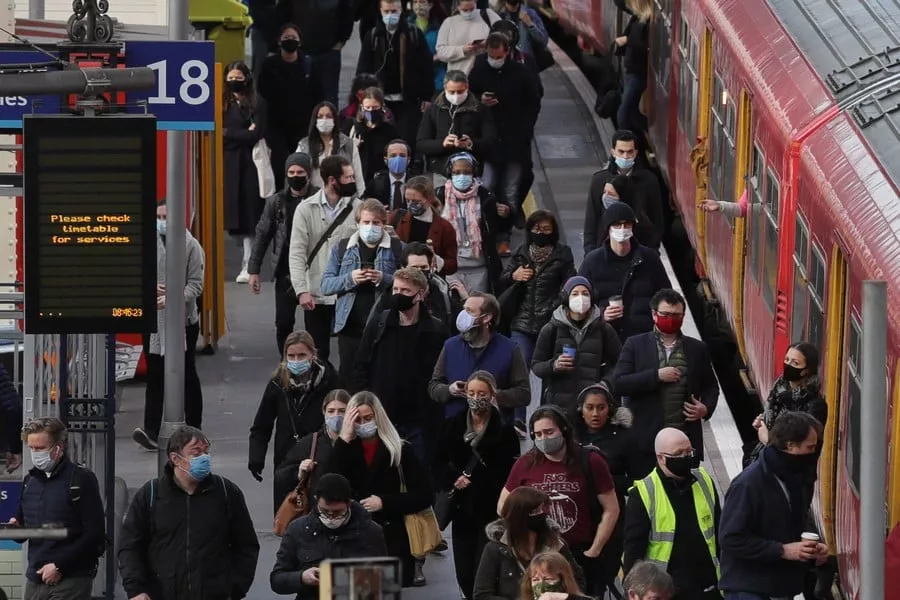 commuters arrive in the morning rush hour at london waterloo train station in london britain photo xinhua commuters arrive in the morning rush hour at london waterloo train station in london britain photo xinhua