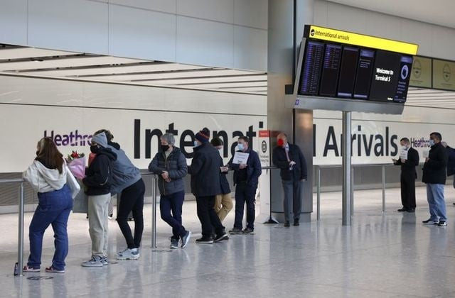 people wait for the arrivals at heathrow airport as tighter rules for international travellers start amid the spread of the coronavirus disease covid 19 pandemic in london britain january 18 2021 photo reuters