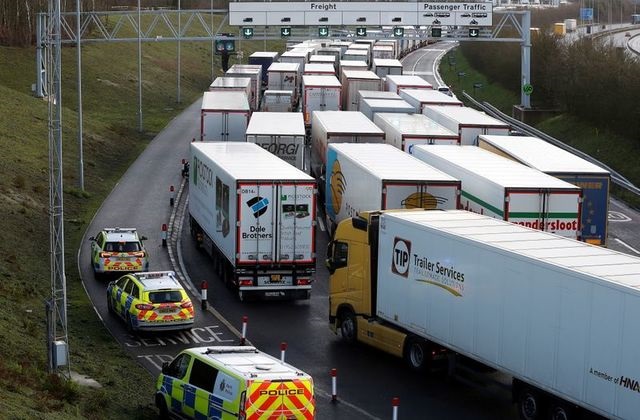 freight vehicles line up prior to boarding a train to france via the channel tunnel amid the coronavirus disease covid 19 outbreak in folkestone britain december 20 2020 photo reuters