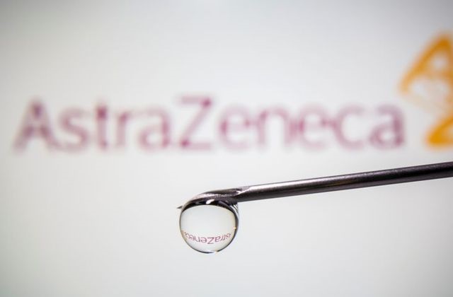 astrazeneca s logo is reflected in a drop on a syringe needle in this illustration taken november 9 2020 photo reuters