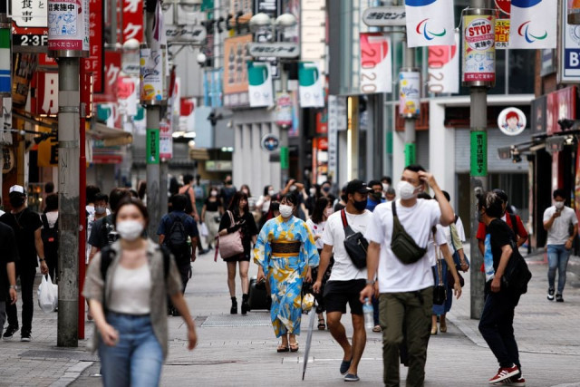 people walk in shibuya shopping area during a state of emergency amid the coronavirus disease covid 19 outbreak in tokyo japan august 29 2021 photo reuters people walk in shibuya shopping area during a state of emergency amid the coronavirus disease covid 19 outbreak in tokyo japan august 29 2021 photo reuters