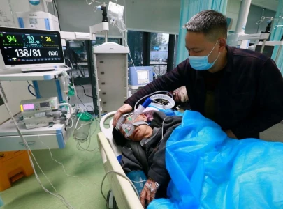 china state media plays down covid wave severity before who meet china state media plays down covid wave severity before who meet
