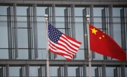 chinese and us flags flutter outside the building of an american company in beijing china january 21 2021 photo reuters
