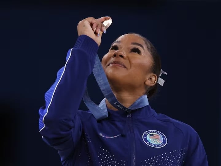 jordan chiles of united states looks at her medal photo reuters