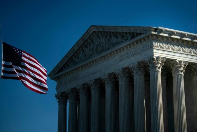 in a 5 4 unsigned opinion the top us court said that some of new york s restrictions violated the first amendment s protection of the free exercise of religion photo afp in a 5 4 unsigned opinion the top us court said that some of new york s restrictions violated the first amendment s protection of the free exercise of religion photo afp