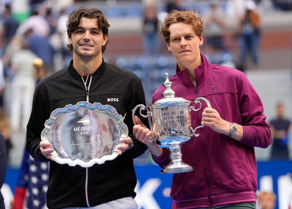 jannik sinner and taylor fritz pose with trophies after us open final match at flushing meadows new york united states on september 8 2024 photo reuters