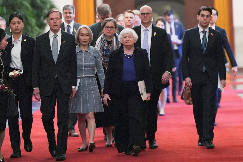 US Treasury Secretary Janet Yellen walks with US ambassador to China Nicholas Burns to attend a meeting with Chinese Premier Li Qiang at the Great Hall of the People in Beijing, China, April 7, 2024. PHOTO: REUTERS