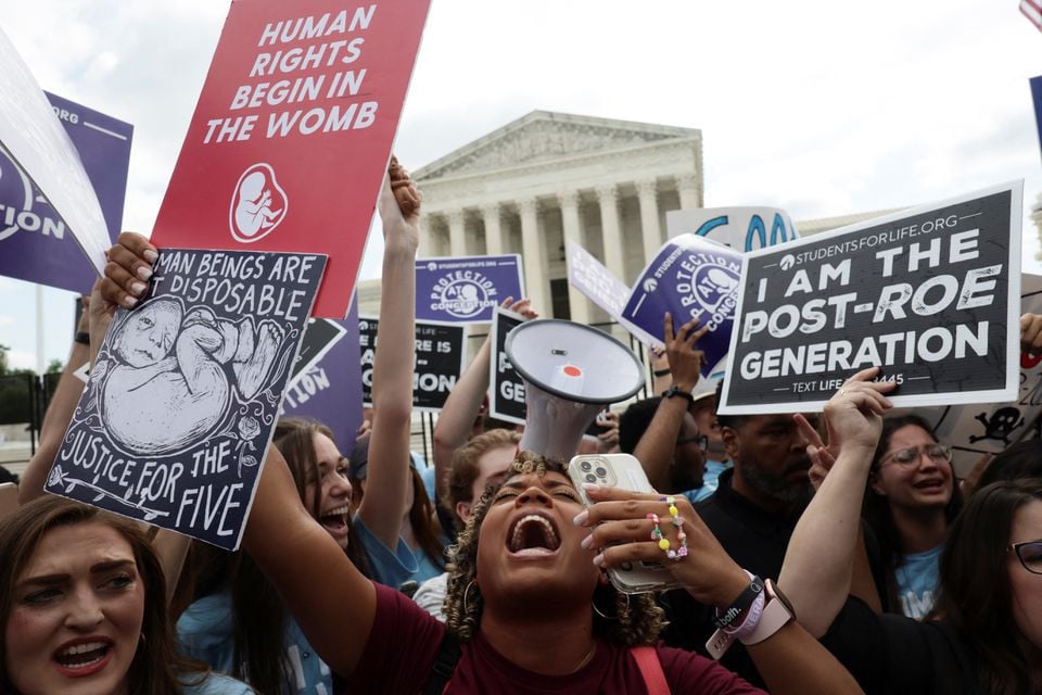 anti abortion demonstrators celebrate outside the united states supreme court as the court rules in the dobbs v women s health organisation abortion case overturning the landmark roe v wade abortion decision in washington us june 24 2022 photo reuters