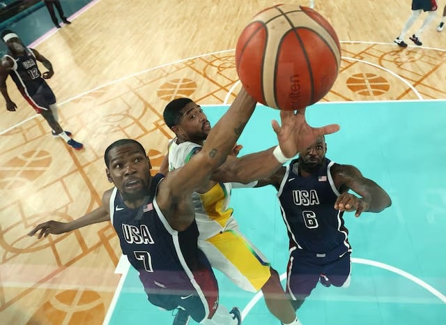 lebron james of united states and kevin durant of united states in action against bruno caboclo of brazil during paris 2024 olympics basketball quarterfinal played in bercy arena paris france on august 06 2024 photo reuters