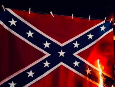 watch us senate candidate burns confederate flag in political ad watch us senate candidate burns confederate flag in political ad