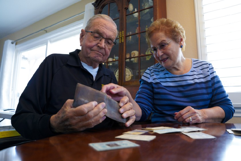 navy veteran paul grisham and his wife carole salazar of san carlos examine the wallet that he lost in antarctica in 1968 photo the san diego union tribune