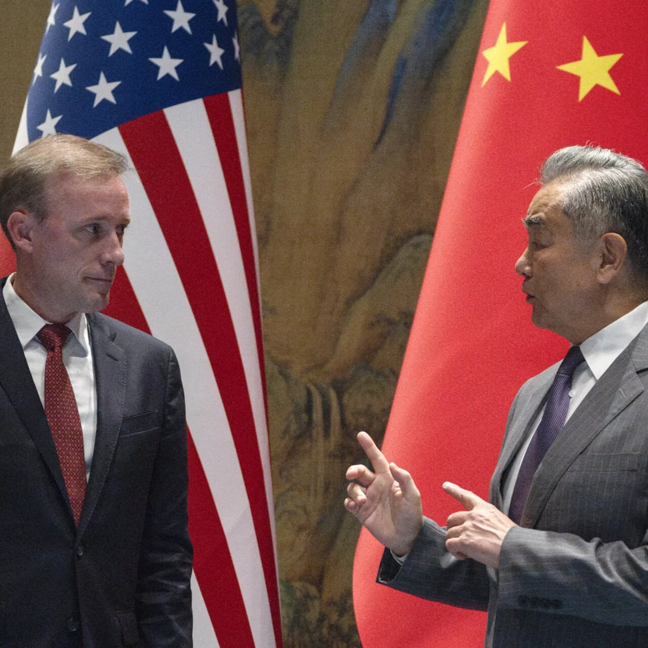 china s foreign minister wang yi gestures near us national security advisor jake sullivan before talks at yanqi lake in beijing on august 27 2024 photo afp china s foreign minister wang yi gestures near us national security advisor jake sullivan before talks at yanqi lake in beijing on august 27 2024 photo afp