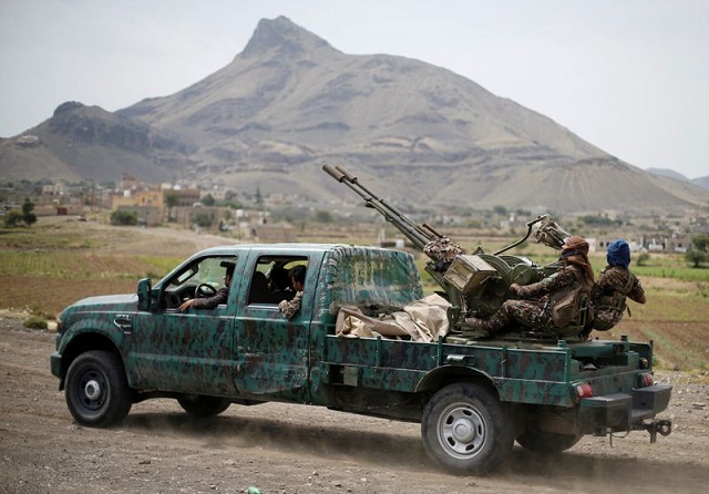 houthi fighters man a machine gun mounted on a military truck as they parade during a gathering of houthi loyalists on the outskirts of sanaa yemen july 8 2020 photo reuters