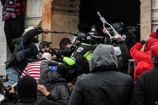 supporters of us president donald trump battle with police at the west entrance of the capitol during a stop the steal protest outside of the capitol building in washington dc us january 6 2021 photo reuters