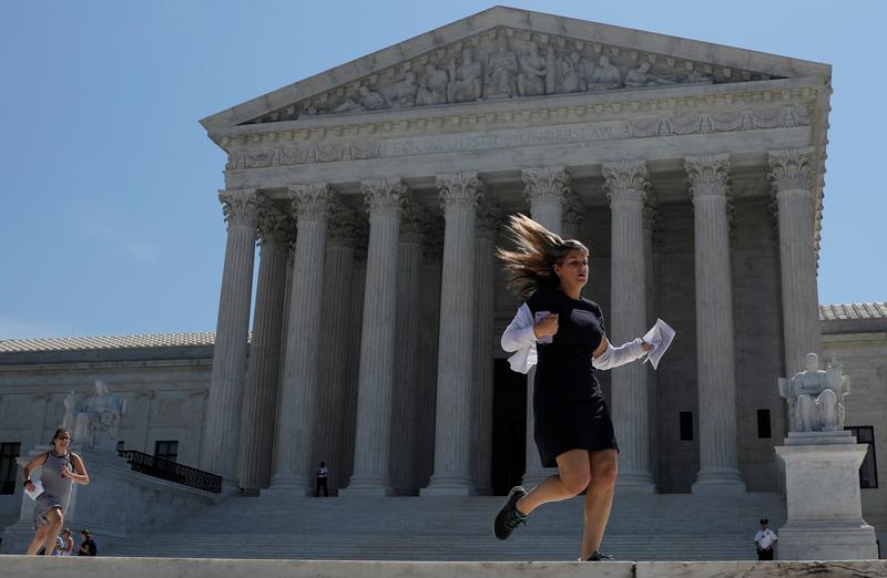 news assistants run outside the us supreme court after the court ruled that us president donald trump s administration did not give an adequate explanation for its plan to add a citizenship question to the 2020 census delivering a victory to new york state and others challenging the proposal in washington photo reuters file