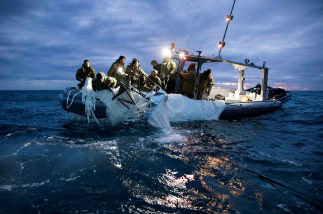 sailors assigned to explosive ordnance disposal group 2 recover a suspected chinese high altitude surveillance balloon that was downed by the united states over the weekend over u s territorial waters off the coast of myrtle beach south carolina u s february 5 2023 u s fleet forces u s navy photo handout file photo sailors assigned to explosive ordnance disposal group 2 recover a suspected chinese high altitude surveillance balloon that was downed by the united states over the weekend over u s territorial waters off the coast of myrtle beach south carolina u s february 5 2023 u s fleet forces u s navy photo handout file photo