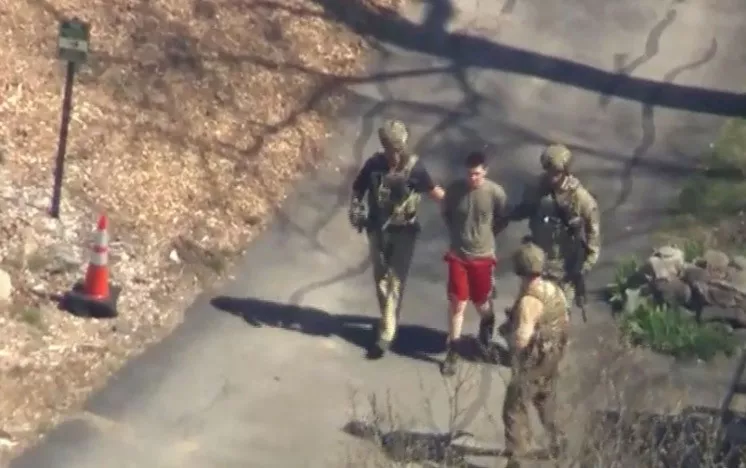 fbi agents arrest jack teixeira an employee of the u s air force national guard in connection with an investigation into the leaks online of classified u s documents outside a residence in this still image taken from video in north dighton massachusetts u s april 13 2023 wcvb tv via abc via reuters fbi agents arrest jack teixeira an employee of the u s air force national guard in connection with an investigation into the leaks online of classified u s documents outside a residence in this still image taken from video in north dighton massachusetts u s april 13 2023 wcvb tv via abc via reuters