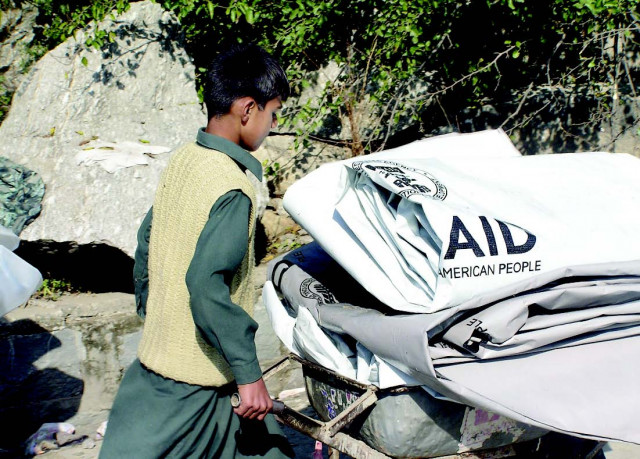 usaid flies in plastic sheets popular after 2005 quake