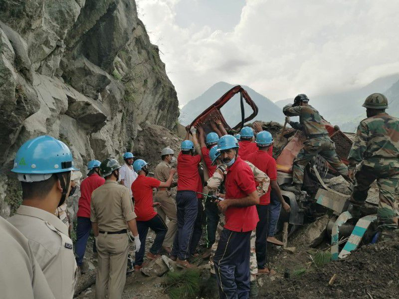 indo tibetan border police itbp personnel remove a damaged truck during a rescue operation at the site of a landslide in kinnaur district in the northern state of himachal pradesh india august 11 2021 photo reuters