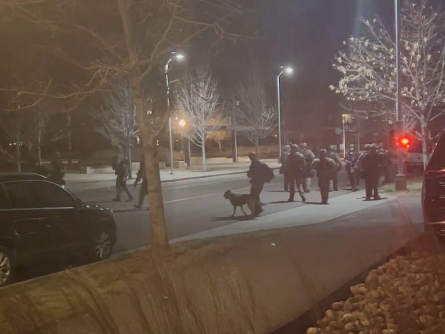 officers gather in the street in lakewood colorado u s december 27 2021 in this still image taken from a social media video reuters