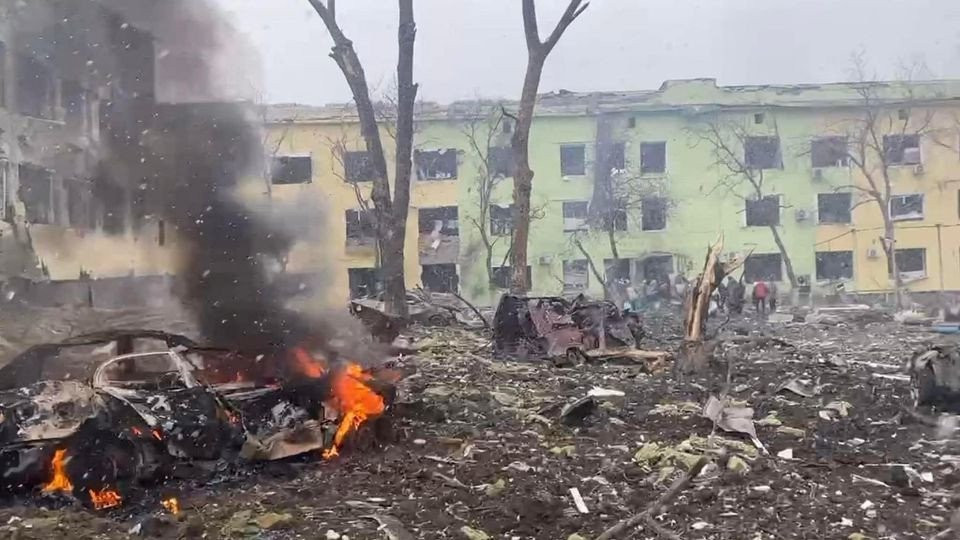a view shows cars and a building of a hospital destroyed by an aviation strike amid russia s invasion of ukraine in mariupol ukraine in this handout picture released march 9 2022 photo reuters