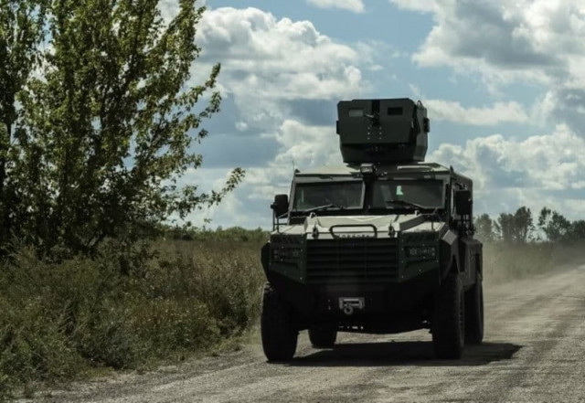 ukrainian servicemen ride a military vehicle amid russia s attack on ukraine near the russian border in sumy region ukraine august 12 2024 photo reuters ukrainian servicemen ride a military vehicle amid russia s attack on ukraine near the russian border in sumy region ukraine august 12 2024 photo reuters