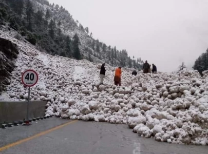 woman dies five injured in torrential rains in k p