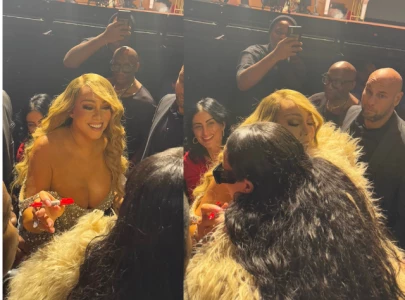 mariah carey has shocking interaction with rihanna during final christmas concert after flu recovery
