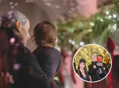 kourtney kardashian and travis barker celebrate christmas in new family photos featuring son rocky