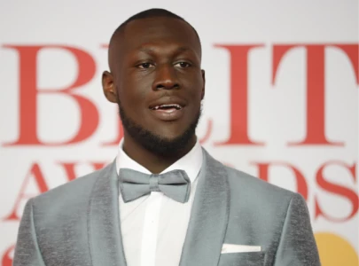 stormzy banned from driving after phone use in 225k rolls royce