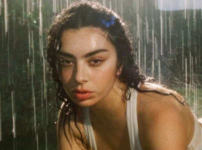 charli xcx showcases skims collection in rainy photoshoot after surgery speculations