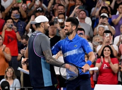 nick kyrgios and novak djokovic secure thrilling doubles victory in brisbane