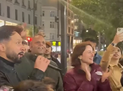 watch hania amir joins street performance on oxford street