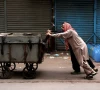 two men push a cart along as karachi faces water shortages photo reuters