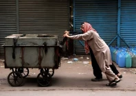 two men push a cart along as karachi faces water shortages photo reuters