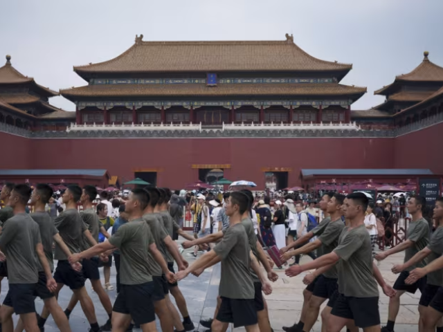 members of the chinese paramilitary police march during a training section at the forbidden city in beijing china on july 21 2024 photo ap