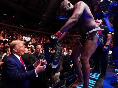 watch jon jones hands ufc title belt to trump after victory over miocic