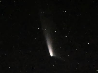 nasa astronaut captures spectacular photos of comet a3 from space