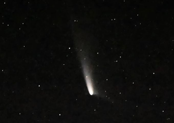 nasa s don pettit snapped comet a3 against a backdrop of stars don pettit nasa