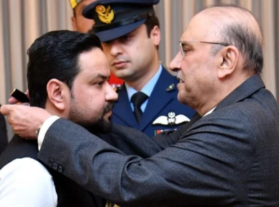 president zardari confers sitara i imtiaz on asif bashir